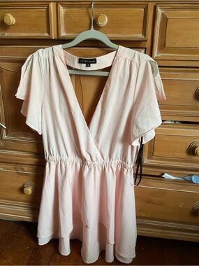 AKIRA blush pink backless wrap mini dress